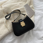 Sac Manon porté épaule, format compact, vue produit, fond neutre