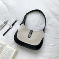 Sac Anouk en toile bicolore, format carré structuré, vue produit, fond neutre